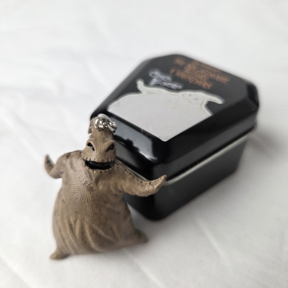 Oogie Boogie Nightmare Before Christmas Charm Figurine with Black Tin